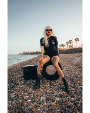 DROP DRUMS NOT BOMBS TEE